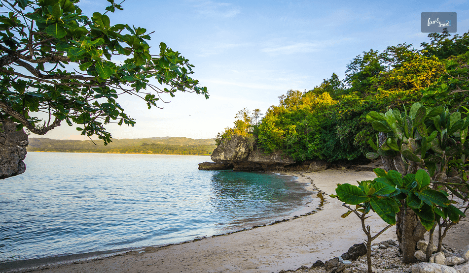 Enjoying The Turquoise Water And White Sand Beach At Salagdoong Beach