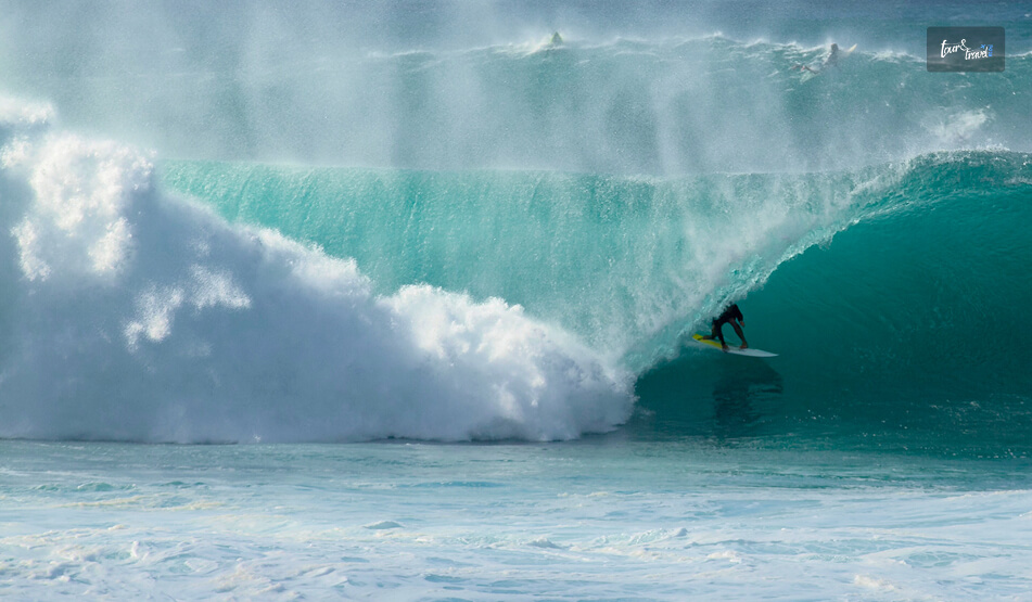 See The Surfers In Action At Banzai Pipeline
