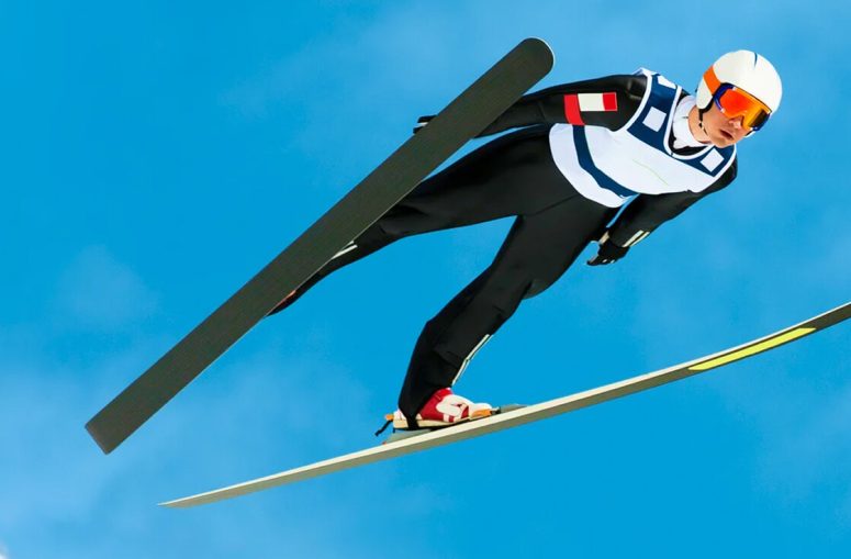 how is it possible for ski jumpers to stay in the air so long and how do they train for that
